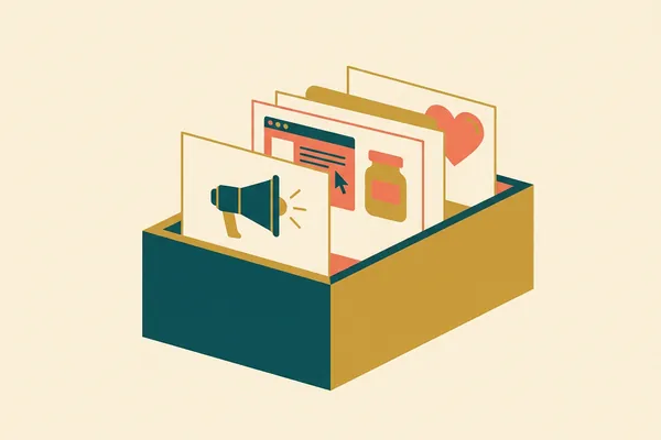 A box of index cards with a megaphone, a heart and a picture.